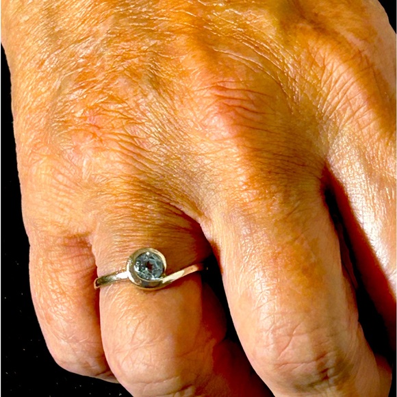 Sterling silver and aquamarine stone. It’s a size 8 in excellent condition. - Picture 3 of 5